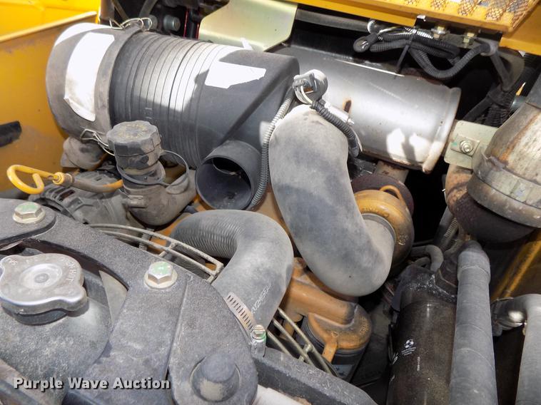 image for item DE7595 2005 John Deere 320 skid steer