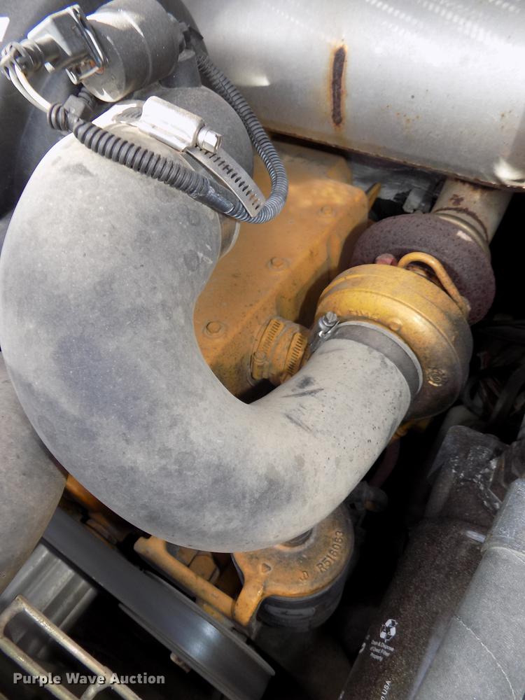 image for item DE7595 2005 John Deere 320 skid steer