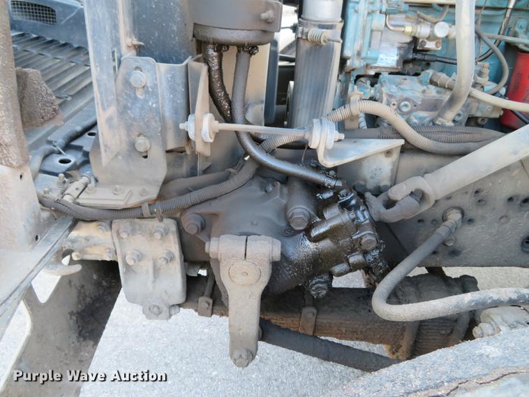 image for item DG3847 1998 International 4900 roll off container truck