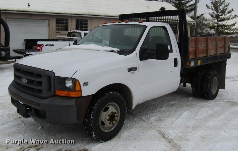 image for item DB6830 1999 Ford F350 Super Duty flatbed pickup truck