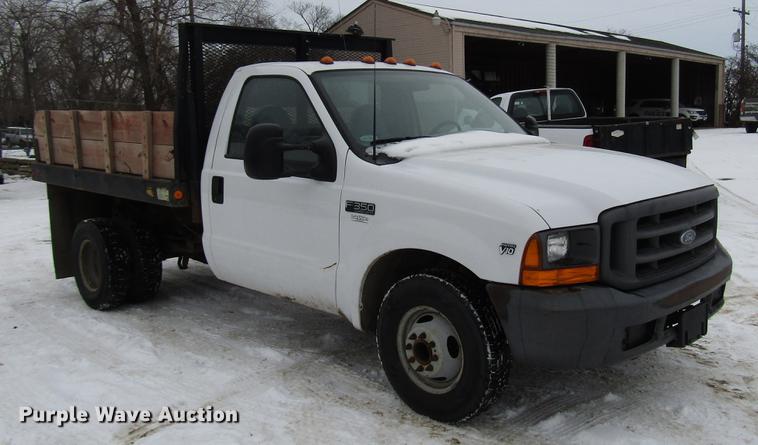 image for item DB6830 1999 Ford F350 Super Duty flatbed pickup truck