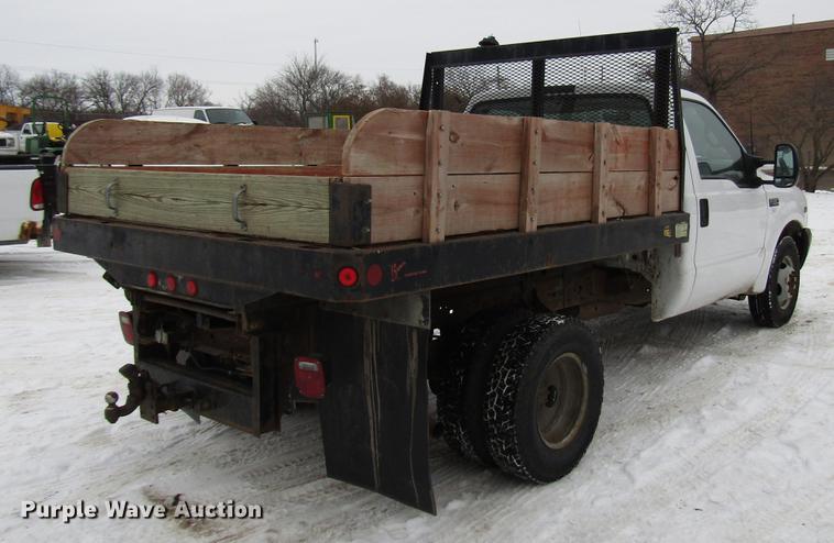 image for item DB6830 1999 Ford F350 Super Duty flatbed pickup truck