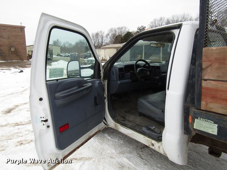 image for item DB6830 1999 Ford F350 Super Duty flatbed pickup truck