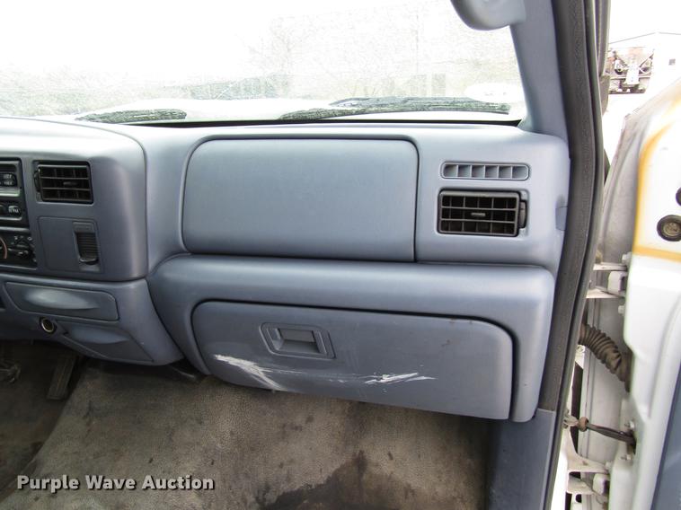 image for item DB6830 1999 Ford F350 Super Duty flatbed pickup truck