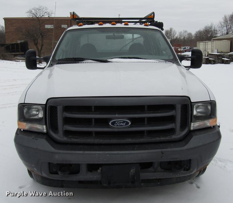 image for item DB6835 2004 Ford F350 Super Duty Crew Cab utility bed pickup truck