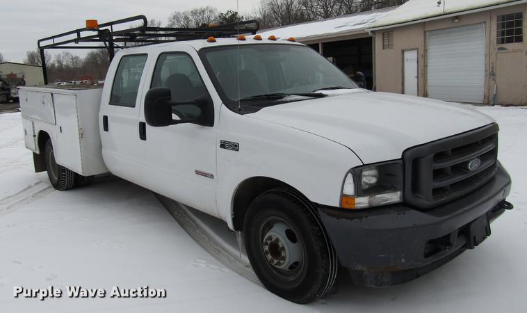 image for item DB6835 2004 Ford F350 Super Duty Crew Cab utility bed pickup truck