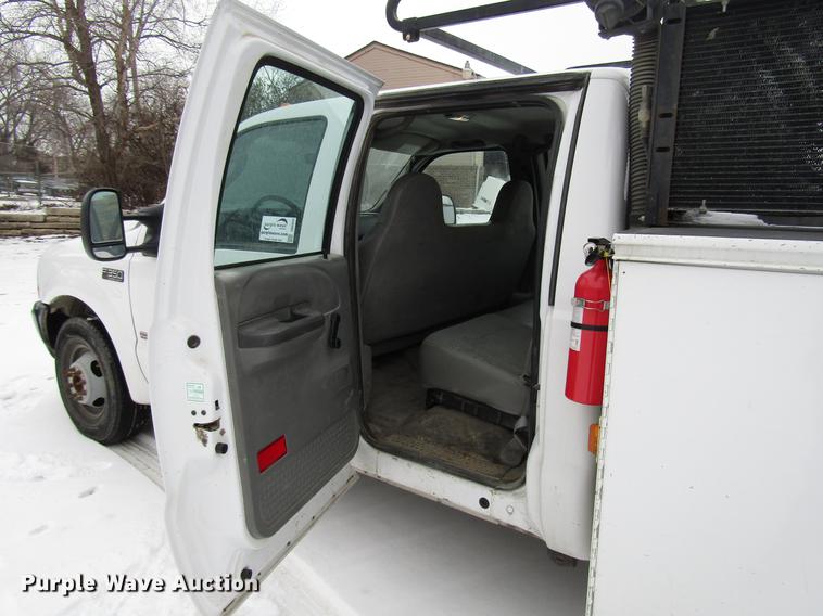 image for item DB6835 2004 Ford F350 Super Duty Crew Cab utility bed pickup truck