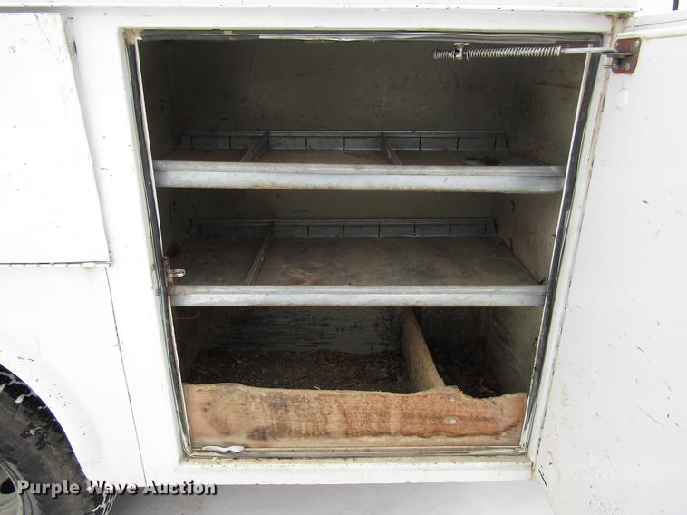 image for item DB6835 2004 Ford F350 Super Duty Crew Cab utility bed pickup truck