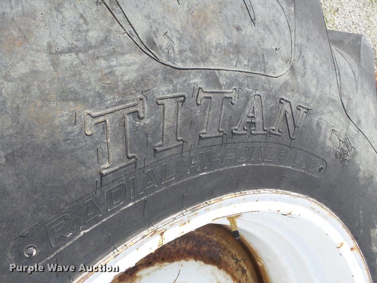 image for item CD9585 (4) Titan 23.1R30 tires and wheels