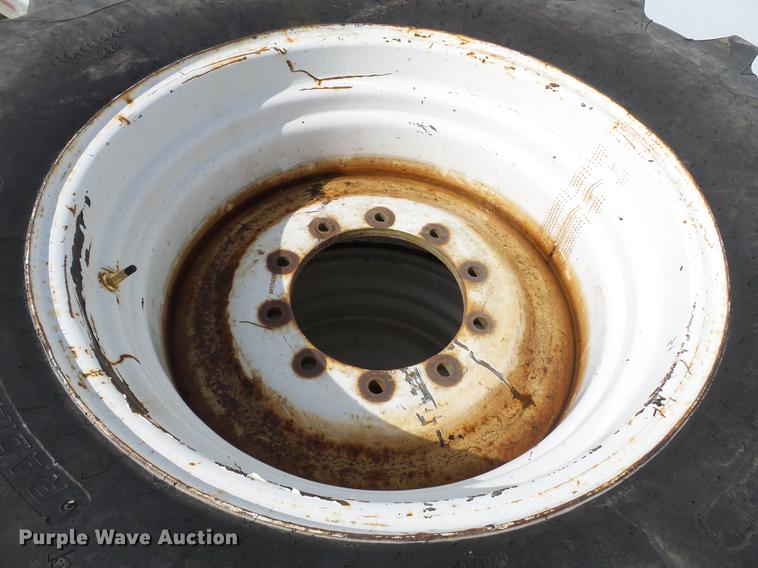 image for item CD9585 (4) Titan 23.1R30 tires and wheels