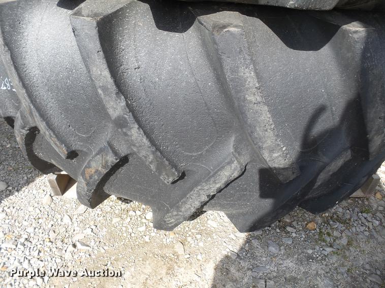 image for item CD9585 (4) Titan 23.1R30 tires and wheels