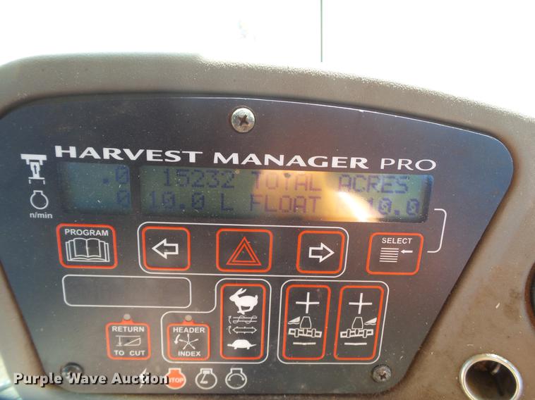 image for item FF9765 2016 MacDon M205 windrower