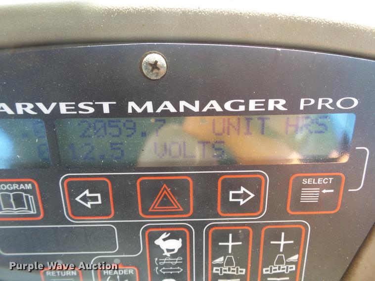 image for item FF9765 2016 MacDon M205 windrower