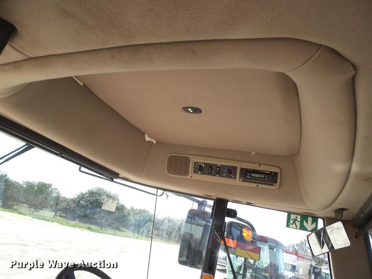 image for item FF9766 2016 MacDon M205 windrower