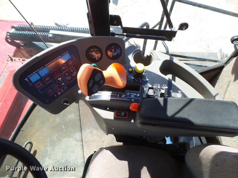 image for item FF9766 2016 MacDon M205 windrower