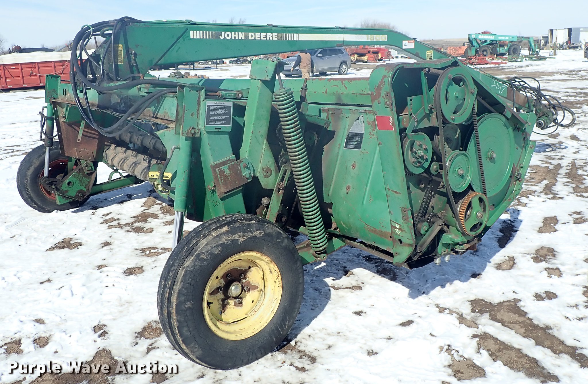 John Deere 1600 windrower in Kinsley, KS Item FH9729 sold Purple Wave