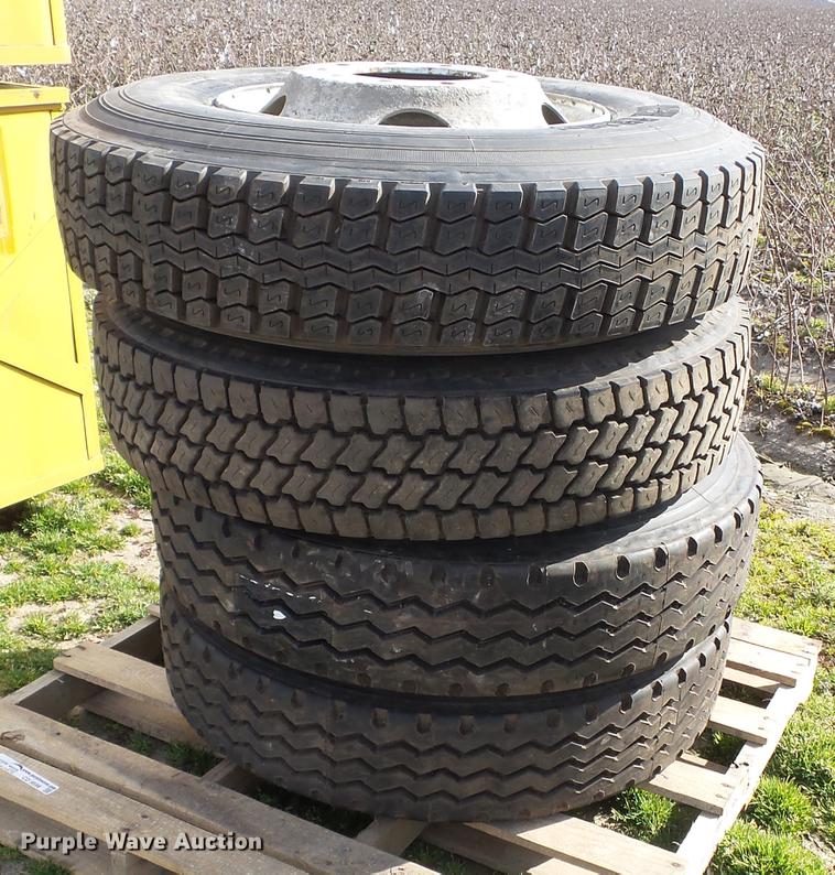 image for item CD9598 (4) 11R22.5 tires and wheels