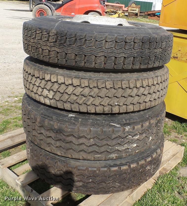 image for item CD9598 (4) 11R22.5 tires and wheels