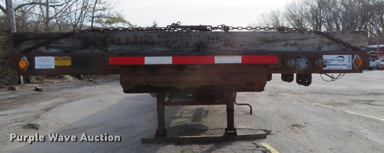 image for item DG3863 2001 Wabash FLCVHCM flatbed trailer