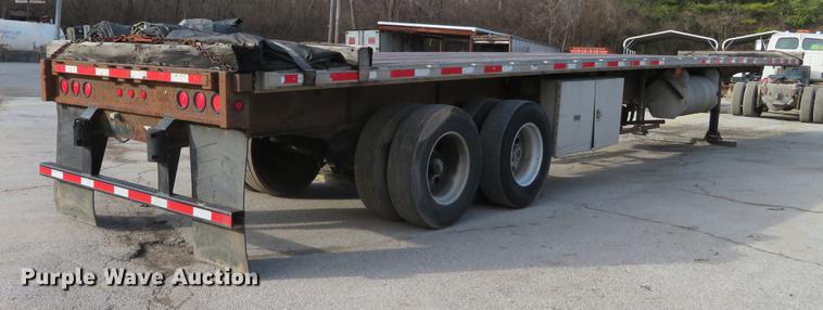 image for item DG3863 2001 Wabash FLCVHCM flatbed trailer