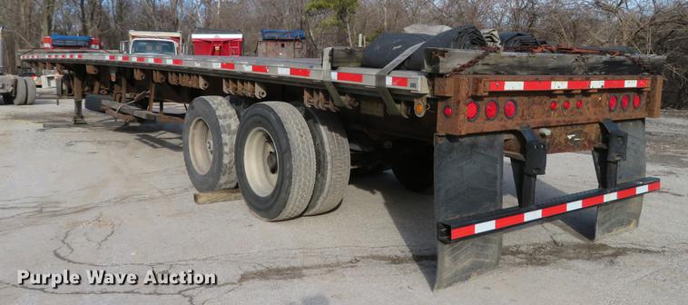 image for item DG3863 2001 Wabash FLCVHCM flatbed trailer