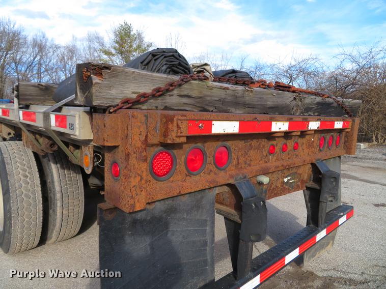 image for item DG3863 2001 Wabash FLCVHCM flatbed trailer