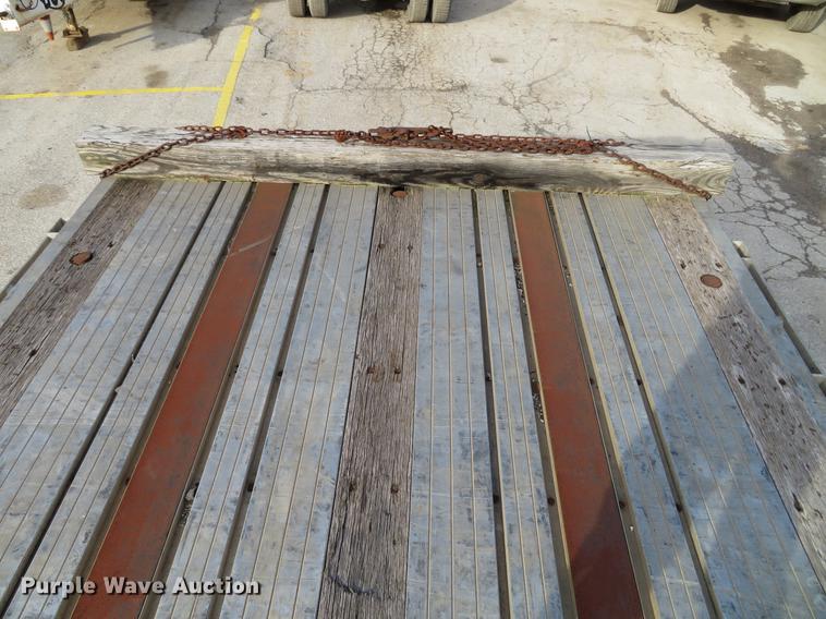 image for item DG3863 2001 Wabash FLCVHCM flatbed trailer