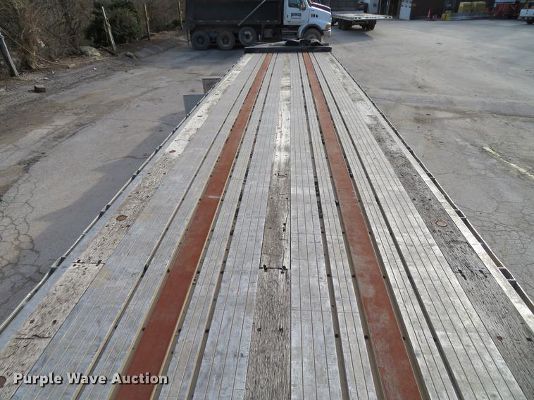 image for item DG3863 2001 Wabash FLCVHCM flatbed trailer