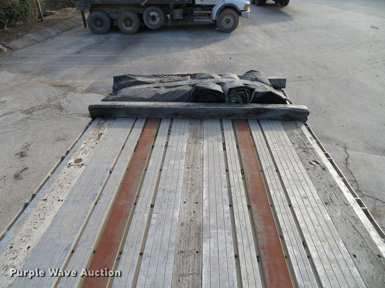 image for item DG3863 2001 Wabash FLCVHCM flatbed trailer
