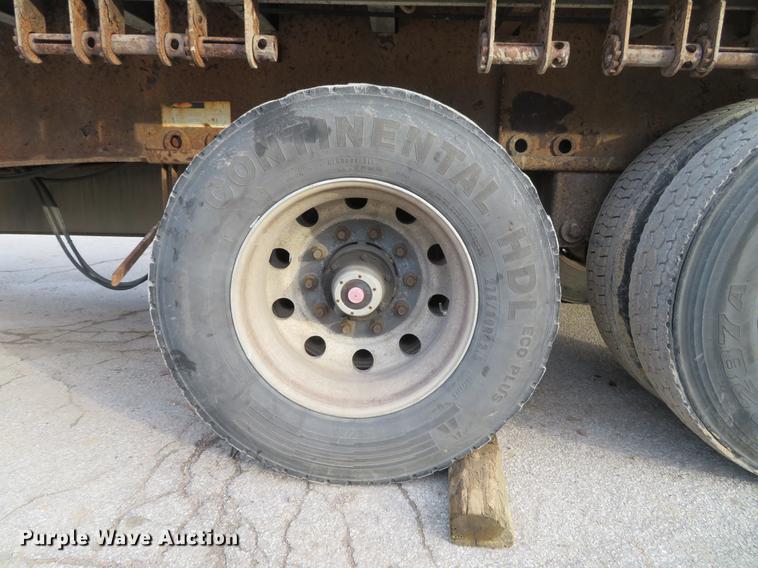 image for item DG3863 2001 Wabash FLCVHCM flatbed trailer