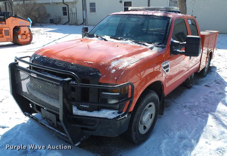 image for item DF2958 2009 Ford F250 Super Duty XL Crew Cab utility bed pickup truck