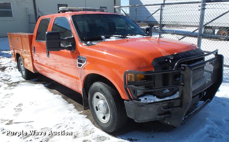 image for item DF2958 2009 Ford F250 Super Duty XL Crew Cab utility bed pickup truck