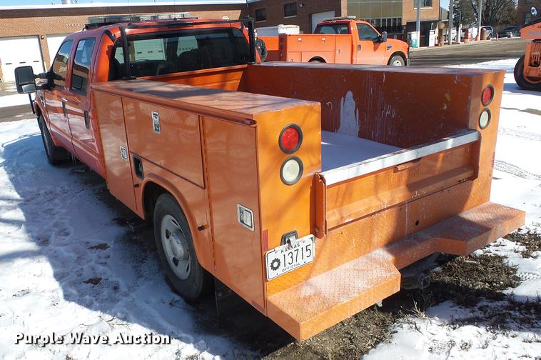 image for item DF2958 2009 Ford F250 Super Duty XL Crew Cab utility bed pickup truck