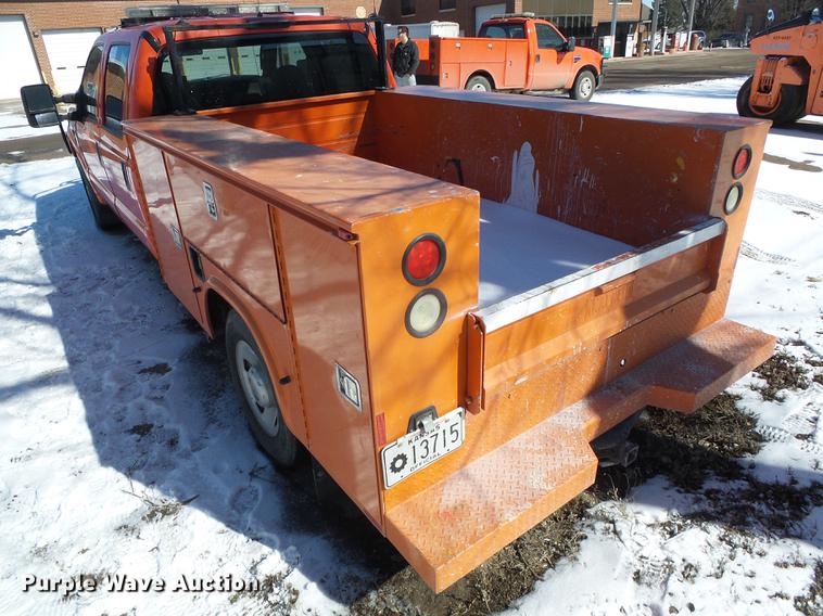 image for item DF2958 2009 Ford F250 Super Duty XL Crew Cab utility bed pickup truck