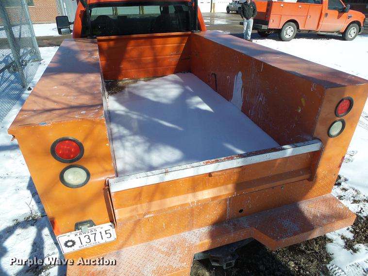 image for item DF2958 2009 Ford F250 Super Duty XL Crew Cab utility bed pickup truck