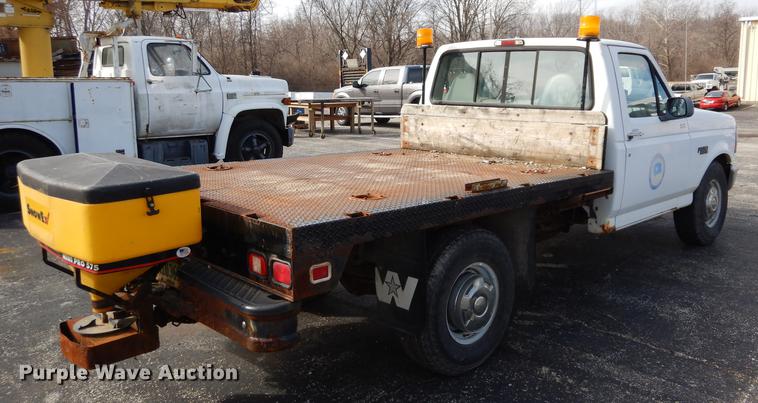 image for item DC8734 1997 Ford F250 flatbed pickup truck