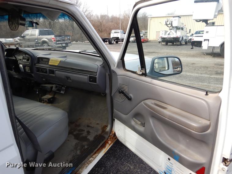 image for item DC8734 1997 Ford F250 flatbed pickup truck