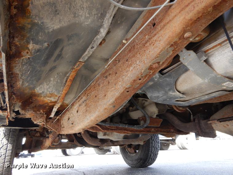 image for item DC8734 1997 Ford F250 flatbed pickup truck