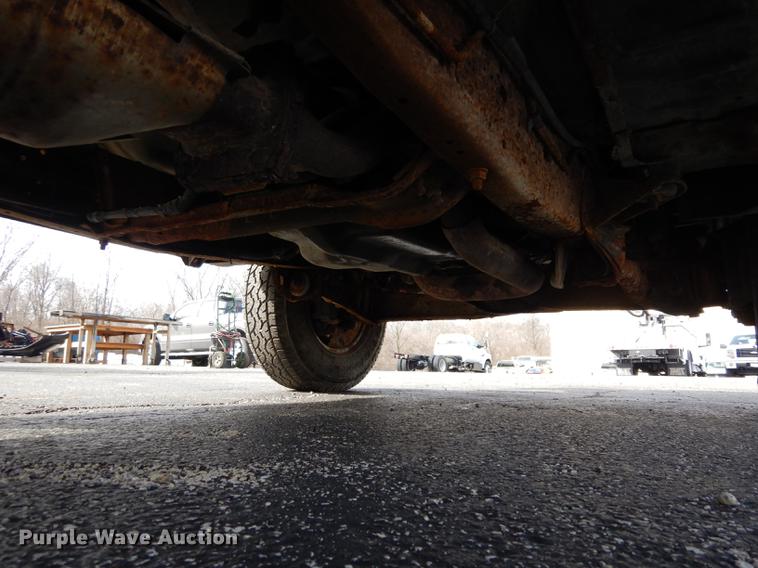 image for item DC8734 1997 Ford F250 flatbed pickup truck