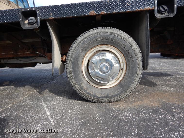 image for item DC8734 1997 Ford F250 flatbed pickup truck