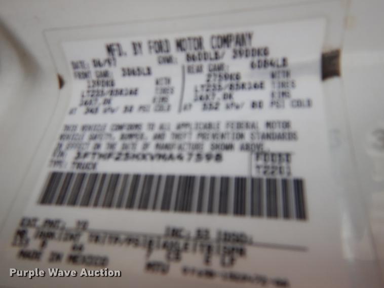 image for item DC8734 1997 Ford F250 flatbed pickup truck