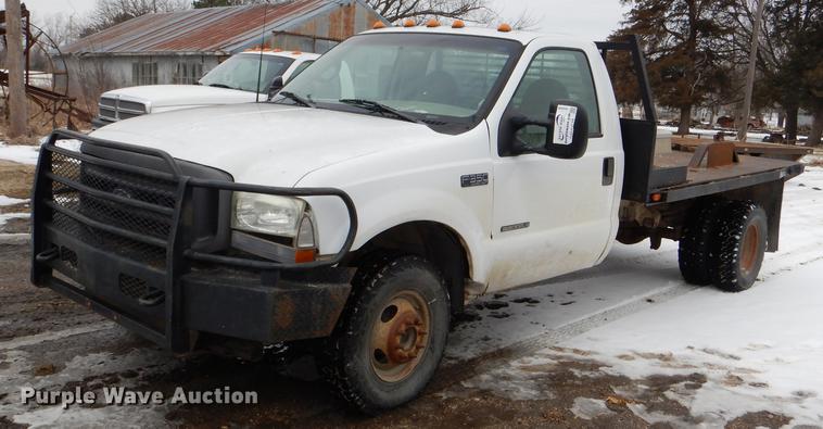 image for item DE0099 2002 Ford F350 Super Duty XL flatbed pickup truck