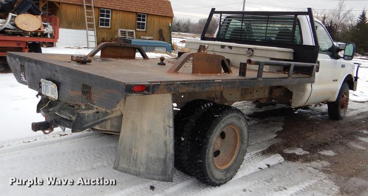 image for item DE0099 2002 Ford F350 Super Duty XL flatbed pickup truck