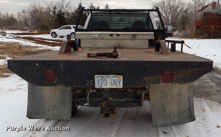 image for item DE0099 2002 Ford F350 Super Duty XL flatbed pickup truck