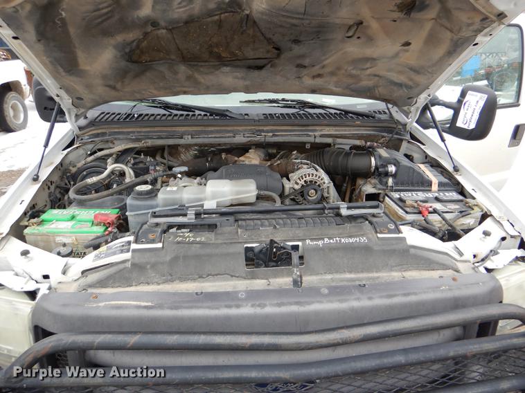 image for item DE0099 2002 Ford F350 Super Duty XL flatbed pickup truck