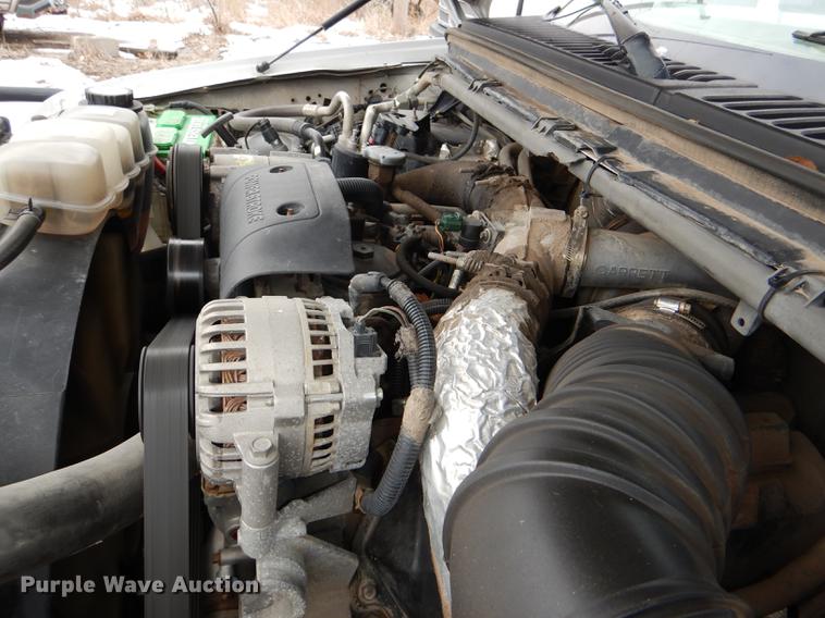 image for item DE0099 2002 Ford F350 Super Duty XL flatbed pickup truck