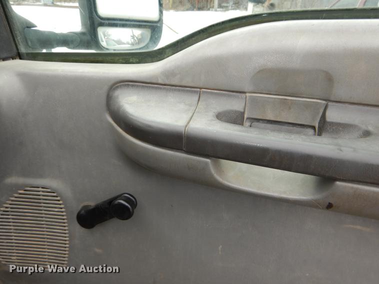 image for item DE0099 2002 Ford F350 Super Duty XL flatbed pickup truck