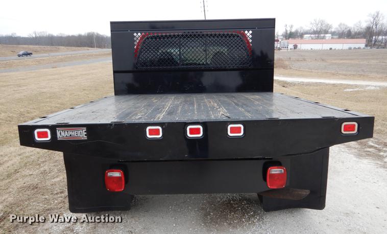 image for item DE6030 2001 Ford F350 Super Duty XLT Crew Cab flatbed pickup truck