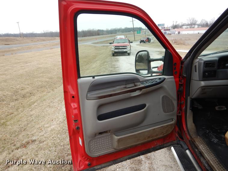 image for item DE6030 2001 Ford F350 Super Duty XLT Crew Cab flatbed pickup truck