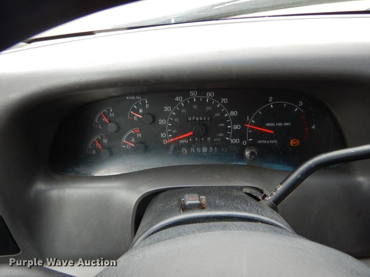 image for item DE6030 2001 Ford F350 Super Duty XLT Crew Cab flatbed pickup truck